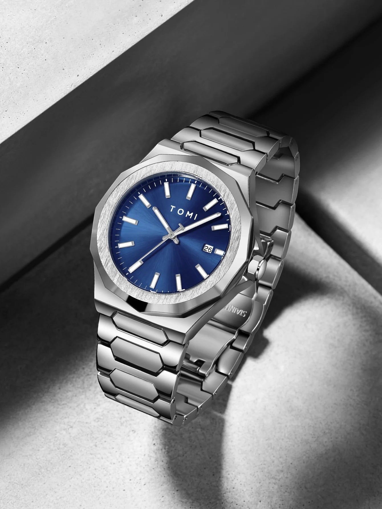 My Store TOMI luxury stainless steel wristwatch with a blue sunray dial and octagonal bezel on a silver link bracelet